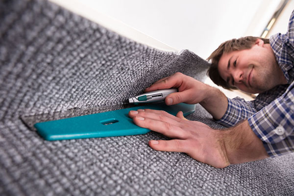 Carpet fitter and floor layer