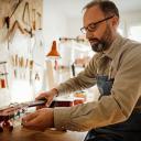 Musical instrument maker and repairer