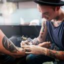 Tattooist and body piercer
